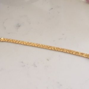 Gold colour bracelet with hearts and “I Love You”